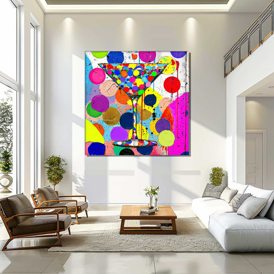 Living room wall art of a multi-colored polka-dotted martini glass and colorful dots in the background. Titled: Dotted Martini Delight-Graphique Addictions.