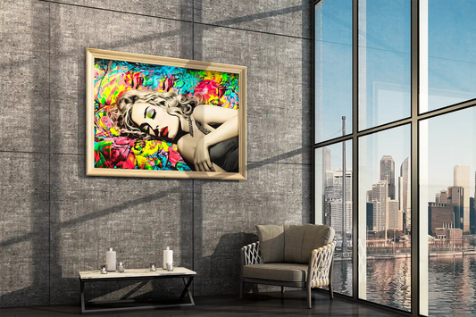 Wall mockup of Madonna lying down with her eyes closed in a black dress, set against a vibrant backdrop of blue, red, and yellow graffiti. Title: Graffiti Lullaby-Graphique Addictions.