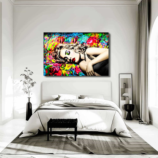 Bedroom wall art of Madonna lying down with her eyes closed in a black dress, set against a vibrant backdrop of blue, red, and yellow graffiti. Title: Graffiti Lullaby-Graphique Addictions.
