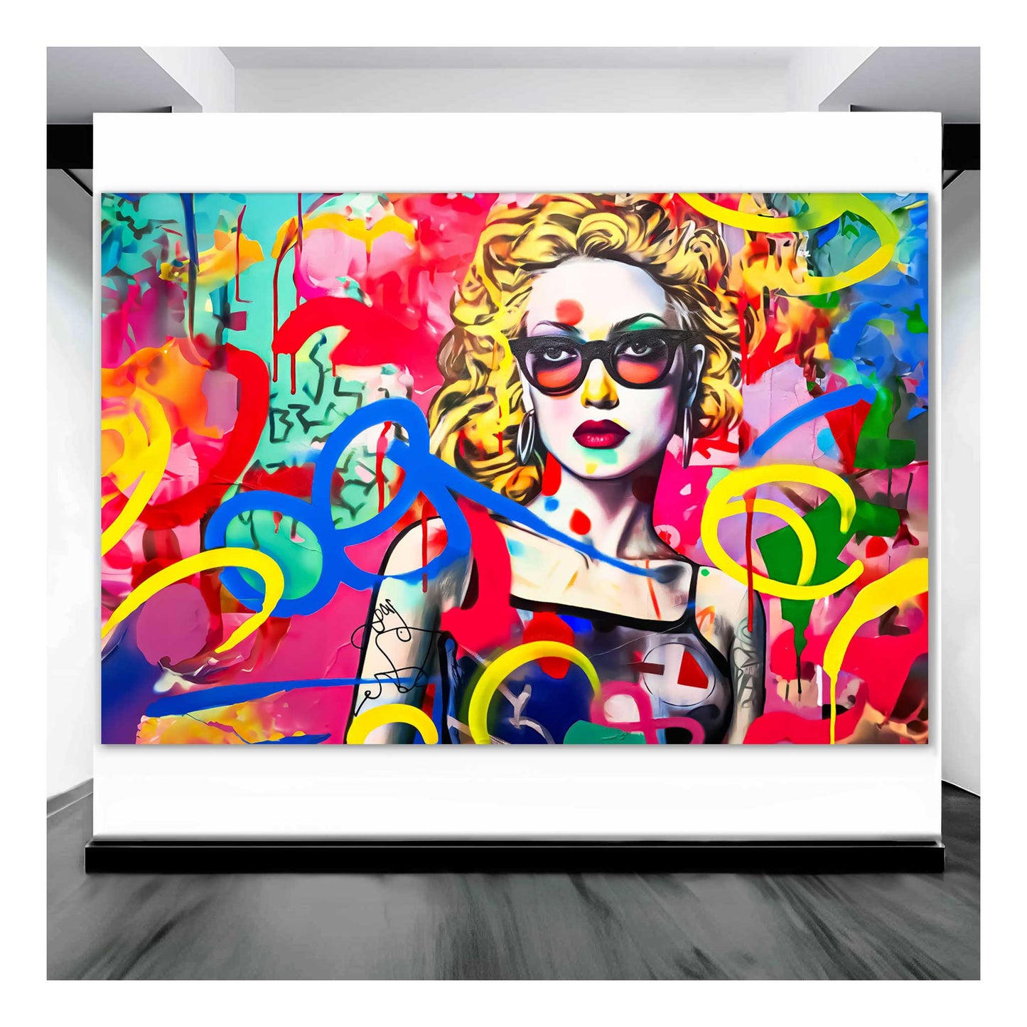 Art gallery mockup of a blonde haired woman with tattoos wearing sunglasses, set against a vibrant graffiti backdrop. Title: Graffiti Tattooed Temptation-Graphique Addictions.