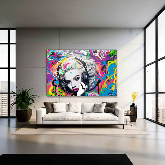 Living room wall decor of Madonna wearing headphones against a backdrop of neon-colored graffiti swirls. Madonna's Street Beats-Graphique Addictions.