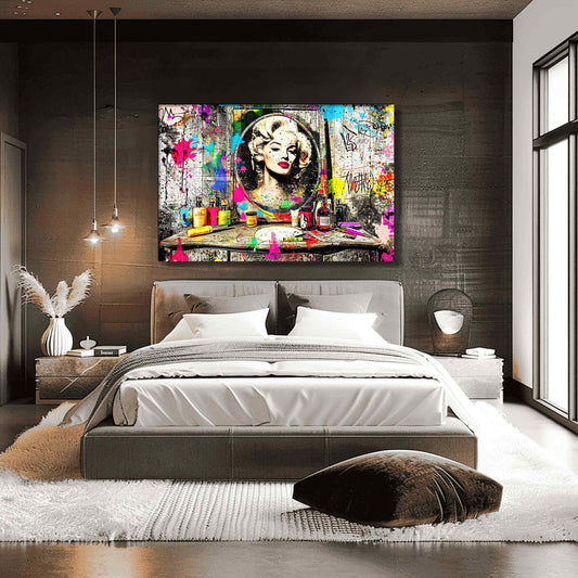 Bedroom mockup of Marilyn Monroe's reflection in a mirror, against an old wooden vanity table covered with makeup, perfume bottles, and colorful graffiti and paint. Marilyn's Painted Mirror-Graphique Addictions.