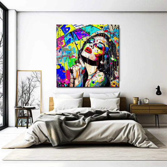 Bedroom wall decor of beautiful woman holding an umbrella against a vibrant storm of colorful paint splashes. Painted Rainstorm Glam-Graphique Addictions