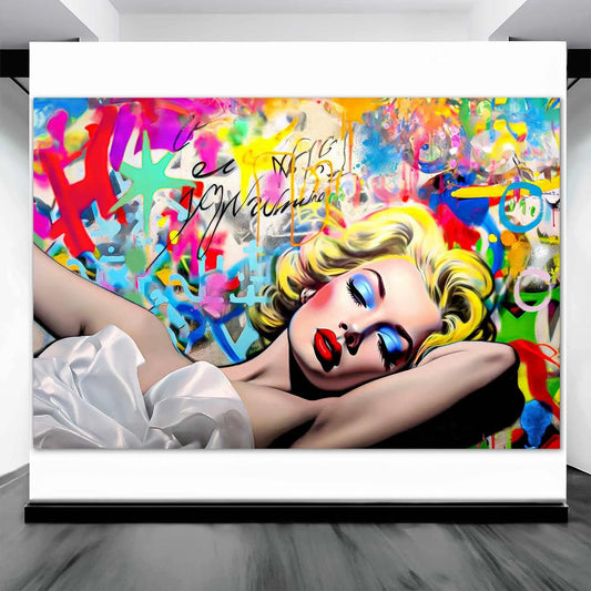 Blonde woman in a white dress lying down, with blue eyeshadow and red lipstick, against a vibrant graffiti wall. Ar display mockup-Street Style Serenade - Graphique Addictions