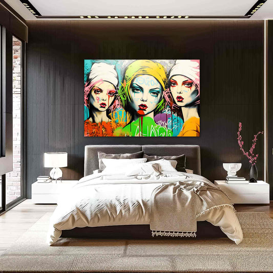 Bedroom wall decor of Three women in red, green, orange with bold makeup and headscarves, set against vibrant green graffiti with purple and white scribbles. Urban Decay Divas - Graphique Addictions