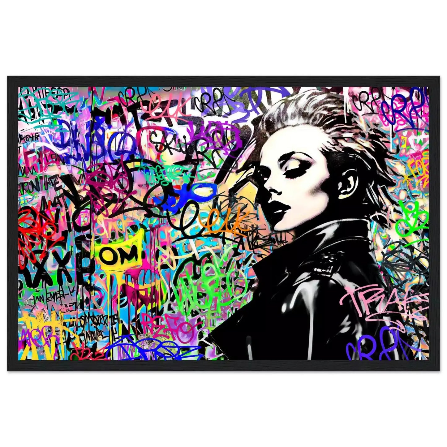 Black wooden framed print of Madonna wearing a black leather jacket against a backdrop of colorful graffiti and lettering. Chromatic Chaos-Graphique Addictions.