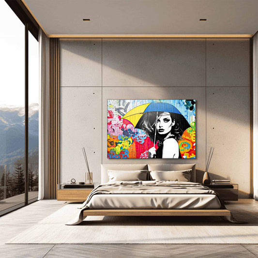 Bedroom wall art of a woman holding an umbrella, surrounded by vibrant graffiti and graph paper patterns in black, blue, yellow, white, and red. Color Me Rainy-Graphique Addictions.