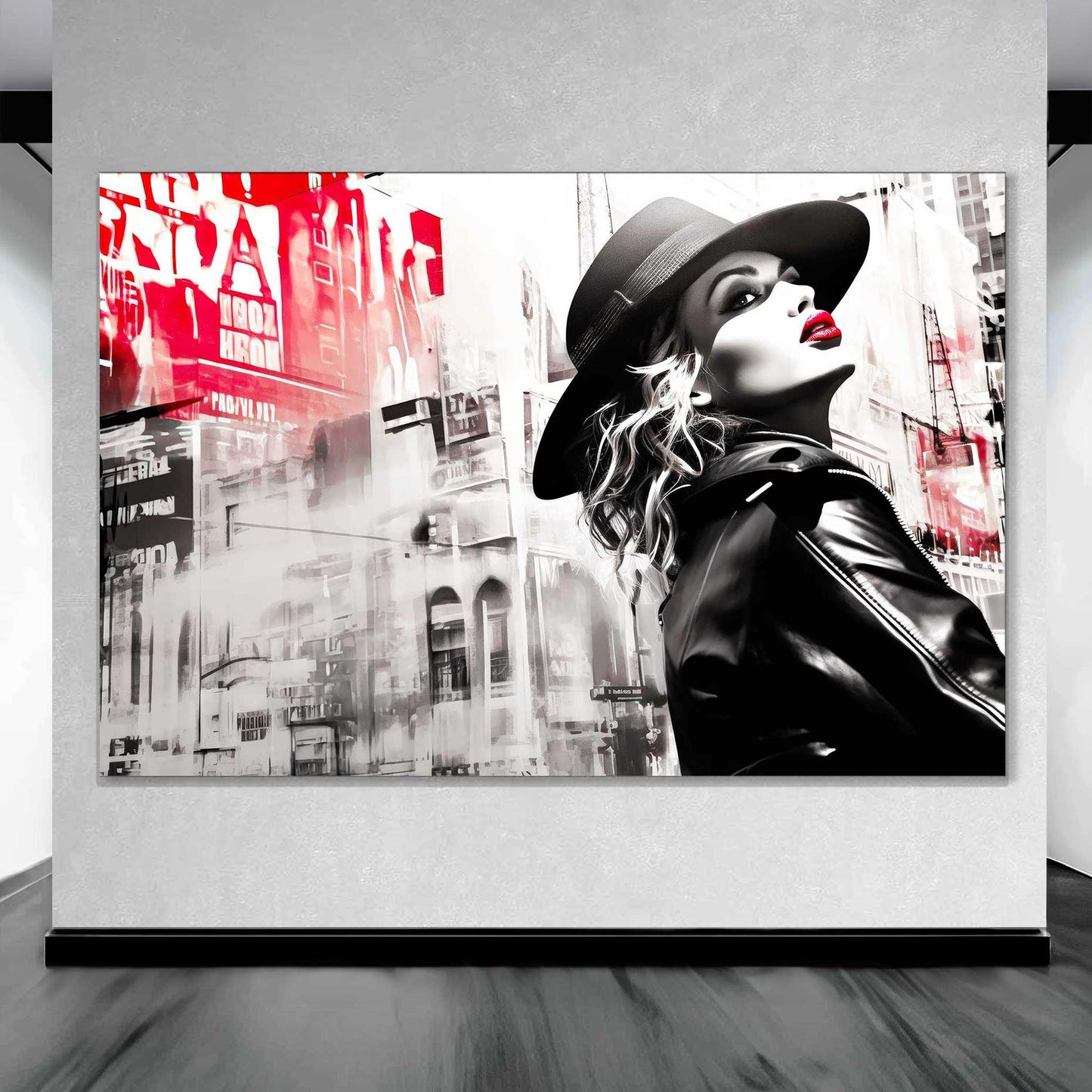 Madonna wearing a black hat, red lipstick, and a leather jacket against a backdrop of New York City buildings art gallery display. Madonna in Noir-Graphique Addictions