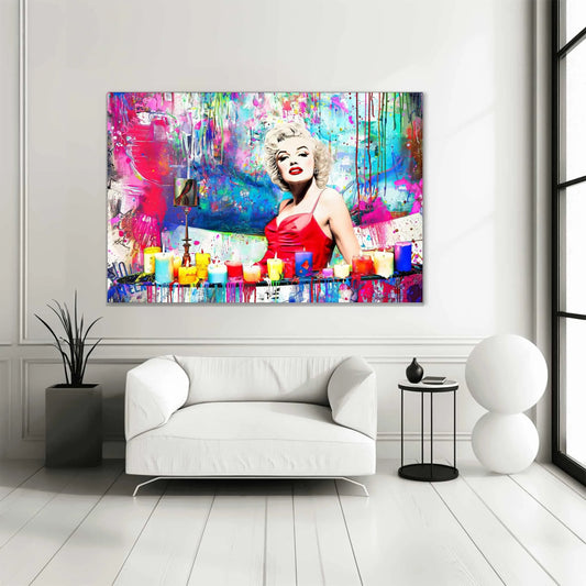 Marilyn Monroe in a red dress, sitting in a bathtub, surrounded by colorful candles and paint splashes, living room wall mockup. Marilyn's Candles and Paint-Graphique Addictions.