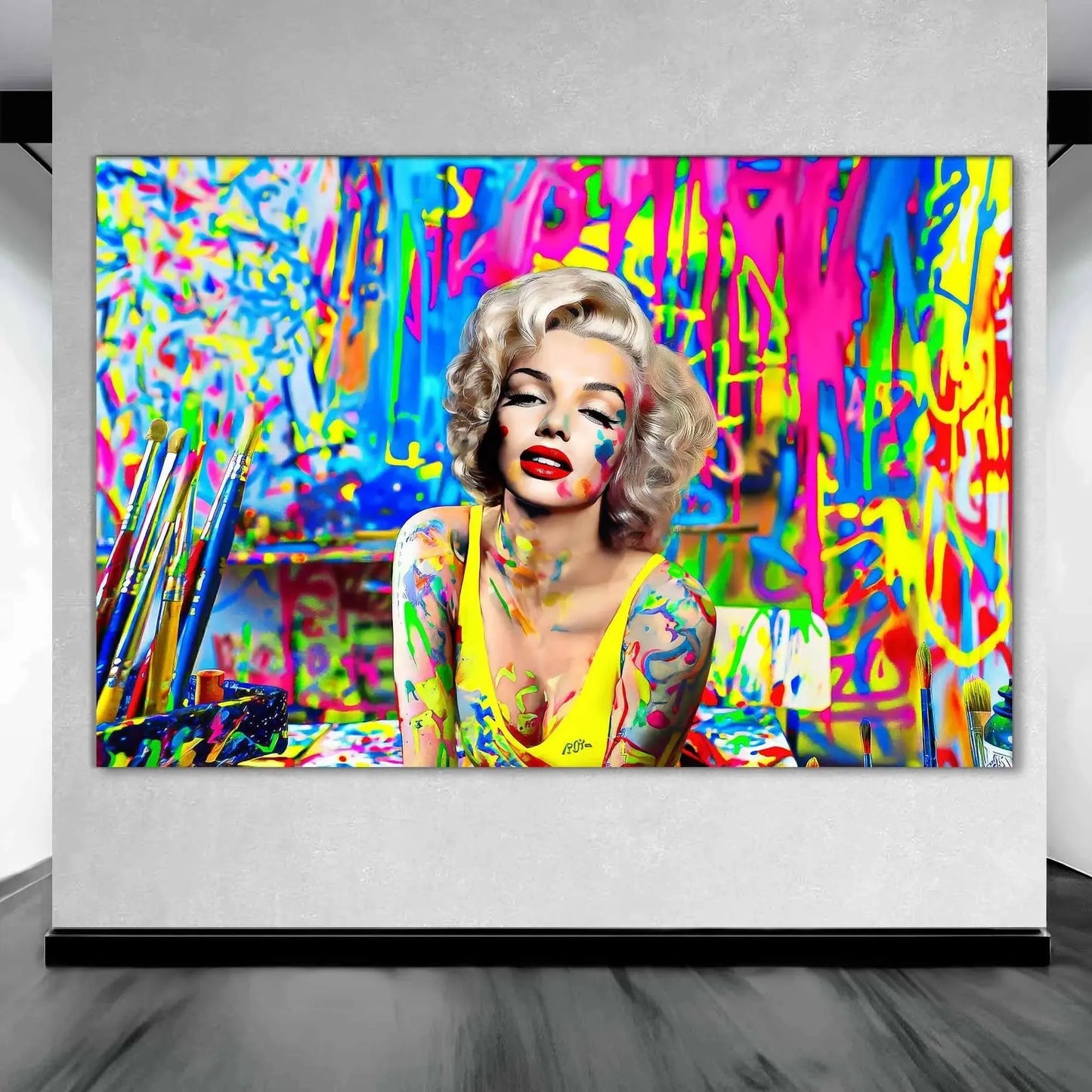 Marilyn Monroe in an art studio, surrounded by colorful paint splashes and brushes, art gallery mockup. Titled-Marilyn's pop studio-Graphique Addictions.