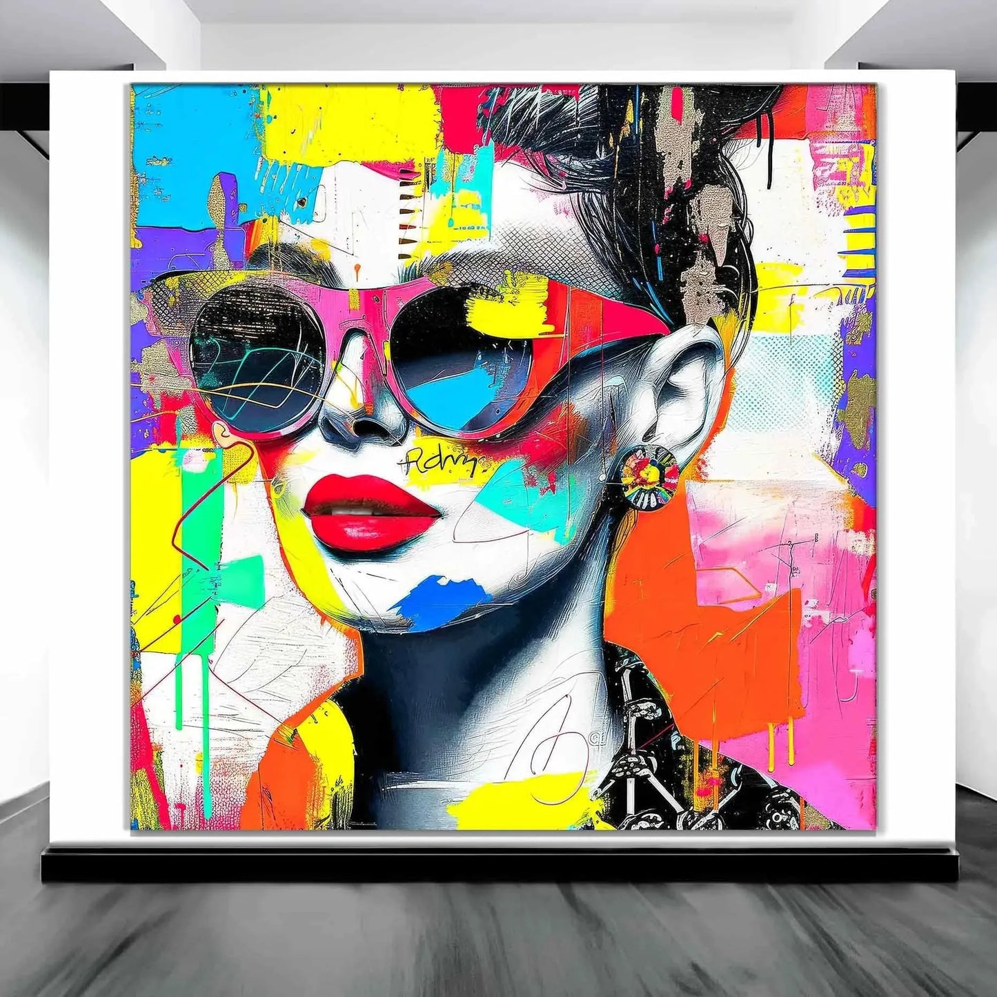 Art gallery display of a portrait of a woman wearing sunglasses, red lips, and a bold earring against colorful abstract strokes, textures, and graffiti-inspired elements. Shades of CompositionsGraphique Addictions