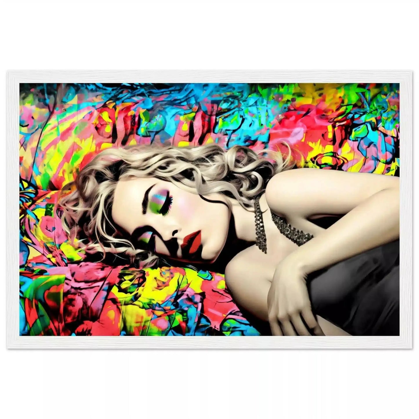 White wooden framed print of Madonna lying down with her eyes closed in a black dress, set against a vibrant backdrop of blue, red, and yellow graffiti. Title: Graffiti Lullaby-Graphique Addictions.