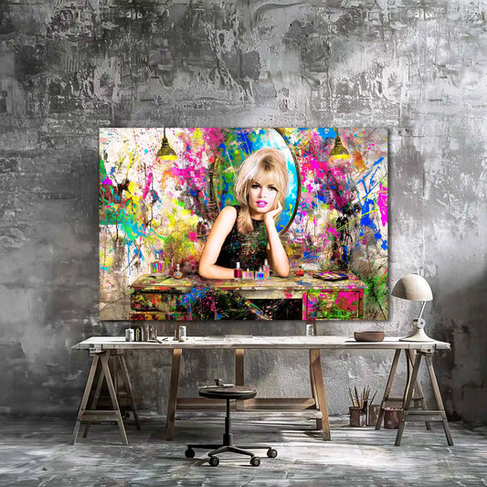 Brigitte Bardot sitting her at a vanity table, surrounded by makeup and hair products, graffiti background with colorful abstract paint splashes, art studio mockup. Brigitte Bardot Vanity Graffiti-Graphique Addictions.