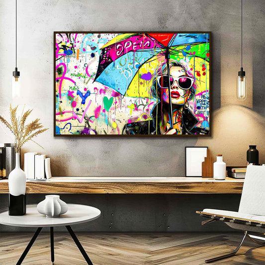 Chic Umbrella: Office mockup of Woman wearing sunglasses and a black leather jacket, holding a multi-colored umbrella-Graphique Addictions.
