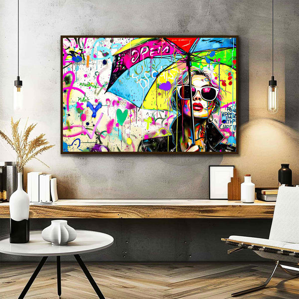Chic Umbrella: Office mockup of Woman wearing sunglasses and a black leather jacket, holding a multi-colored umbrella-Graphique Addictions.
