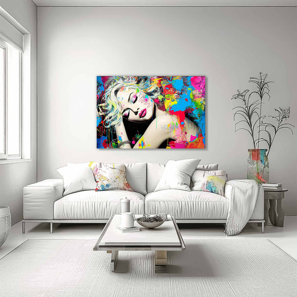 Blonde woman with colorful makeup, tattoos, and graffiti against a backdrop of colorful splashes. Living room wall artwork titled: Colorful Captivation-Graphique Addictions. 