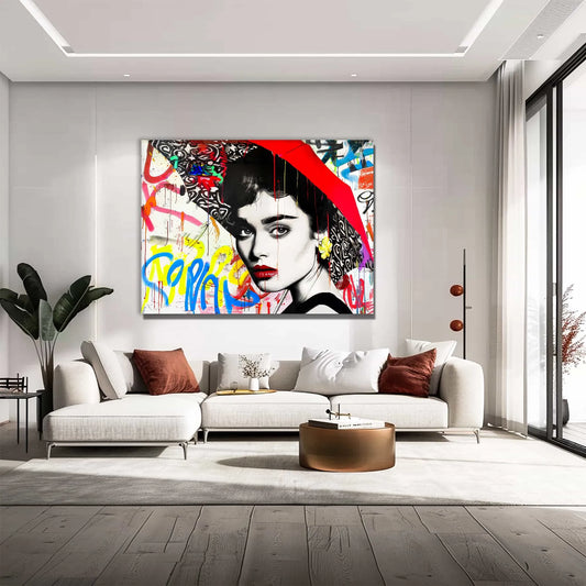 Living room wall decor of Audrey Hepburn holding a red umbrella, white backdrop of yellow, blue, and red street-art. Graffiti Rainstorm-Graphique Addictions. 
