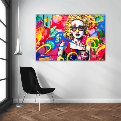 Living room wall art print of a blonde haired woman with tattoos wearing sunglasses, set against a vibrant graffiti backdrop. Title: Graffiti Tattooed Temptation-Graphique Addictions.