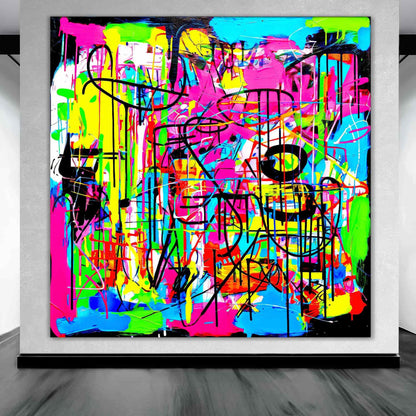 Art gallery display of abstract painting of bold, neon colors in pink, blue, green, yellow, orange, black, and white, graffiti-style brushstrokes and splashes. Liquid Chaos-Graphique Addictions.
