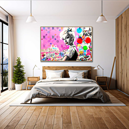Bedroom mockup of a barbie inspired doll wearing a black dress with white ruffles against a bubblegum pink backdrop of colorful LV monograms and graffiti and balloons. Luxe Pink Vuitton-Graphique Addictions.