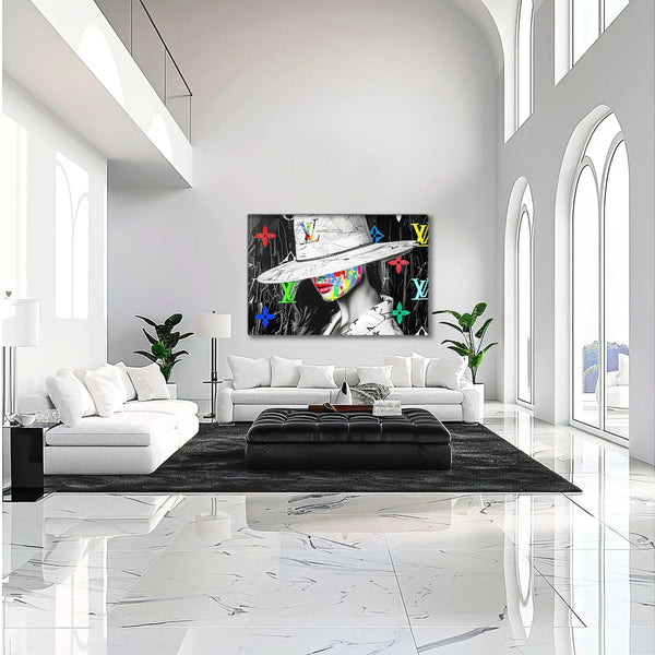 Living room wall decor of a woman with colorful graffiti on her face, wearing a wide-brimmed white hat and Louis Vuitton logos in background. Luxury meets graffiti, graphique addictions.