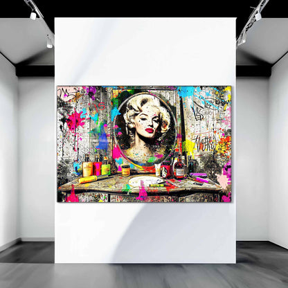 Art gallery mockup of Marilyn Monroe's reflection in a mirror, against an old wooden vanity table covered with makeup, perfume bottles, and colorful graffiti and paint. Marilyn's Painted Mirror-Graphique Addictions.