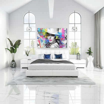 Bedroom wall decor of a beautiful woman in a stylish white hat, against a backdrop of colorful graffiti and street-art style paint splashes and Louis Vuitton-inspired logos. Monogram Vogue Elegance-Graphique Addictions.