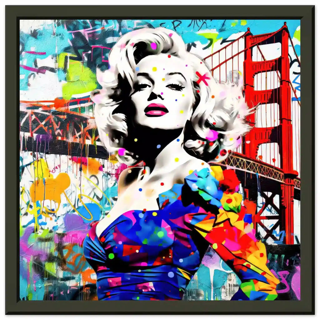 Black metal framed print featuring Marilyn Monroe in a colorful blue dress, standing in front of the Golden Gate Bridge, made of colorful graffiti and paint splashes.Titled: Golden Gate Graffiti-Graphique Addictions.