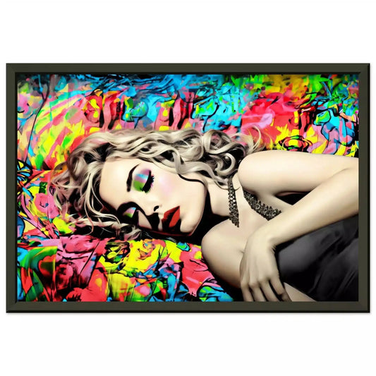 Black metal framed print of Madonna lying down with her eyes closed in a black dress, set against a vibrant backdrop of blue, red, and yellow graffiti. Title: Graffiti Lullaby-Graphique Addictions.