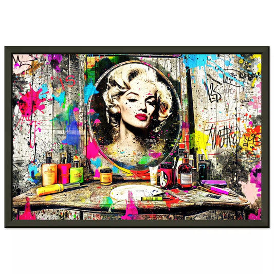 Black metal framed print of Marilyn Monroe's reflection in a mirror, against an old wooden vanity table covered with makeup, perfume bottles, and colorful graffiti and paint. Marilyn's Painted Mirror-Graphique Addictions.