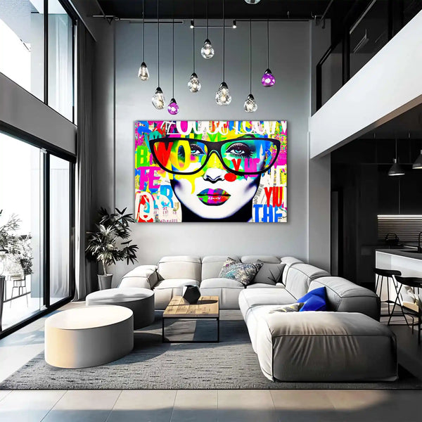 Living room wall decor portrait of a woman wearing black glasses, set against a white background with colorful graffiti-style letters. Shades of Typography-Graphique Addictions.