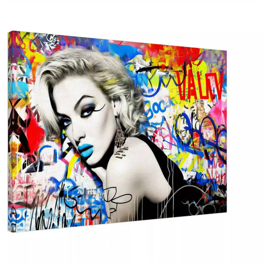 Canvas print of woman lying on her stomach, surrounded by vibrant graffiti, wearing blue lipstick and winged eyeliner, in a black dress. Titled: Graffiti Dreamscape-Graphique Addictions.