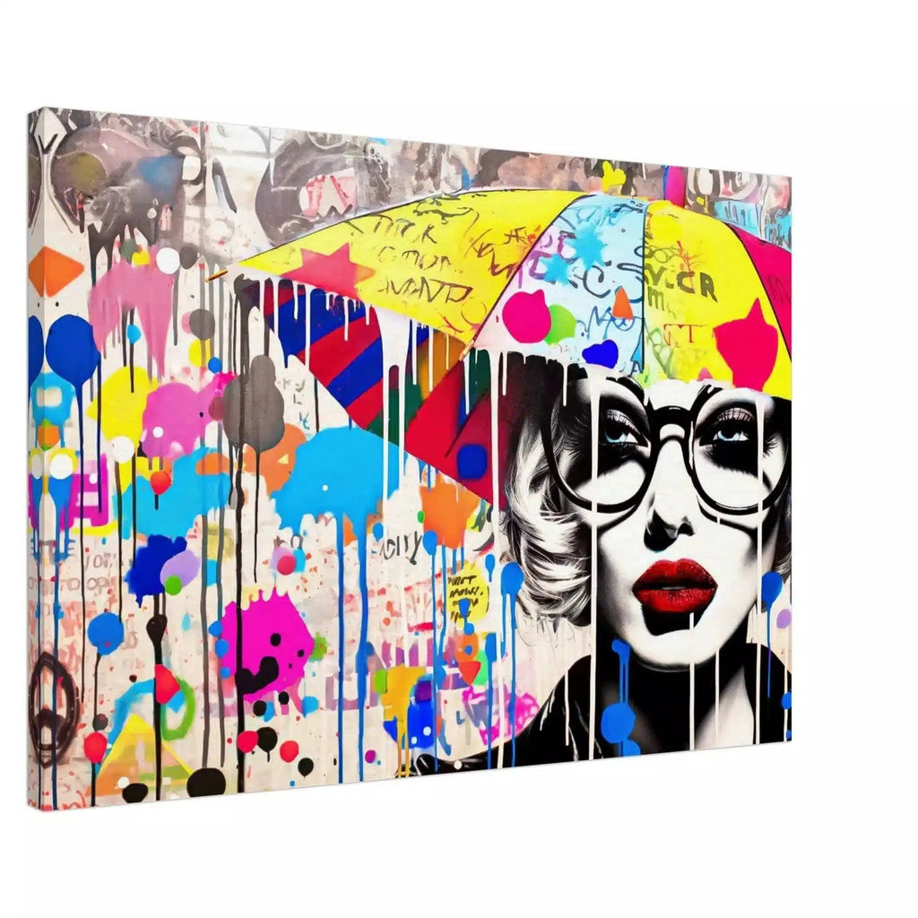 Slim canvas print of a woman holding an umbrella, wearing black glasses and surrounded by colorful paint splatters and graffiti symbols. Painted Rain Pop-Graphique Addictions.