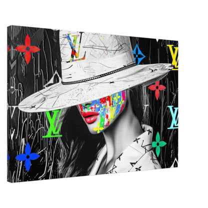 Thick canvas print of a woman with colorful graffiti on her face, wearing a wide-brimmed white hat and Louis Vuitton logos in background. Luxury meets graffiti, graphique addictions.
