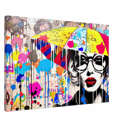 Thick canvas print of a woman holding an umbrella, wearing black glasses and surrounded by colorful paint splatters and graffiti symbols. Painted Rain Pop-Graphique Addictions.