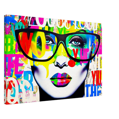 Thick canvas print portrait of a woman wearing black glasses, set against a white background with colorful graffiti-style letters. Shades of Typography-Graphique Addictions.
